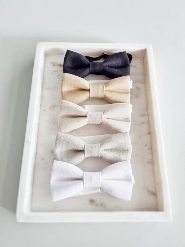 Selection of neutral linen bow ties from black to beige, stone and oatmeal